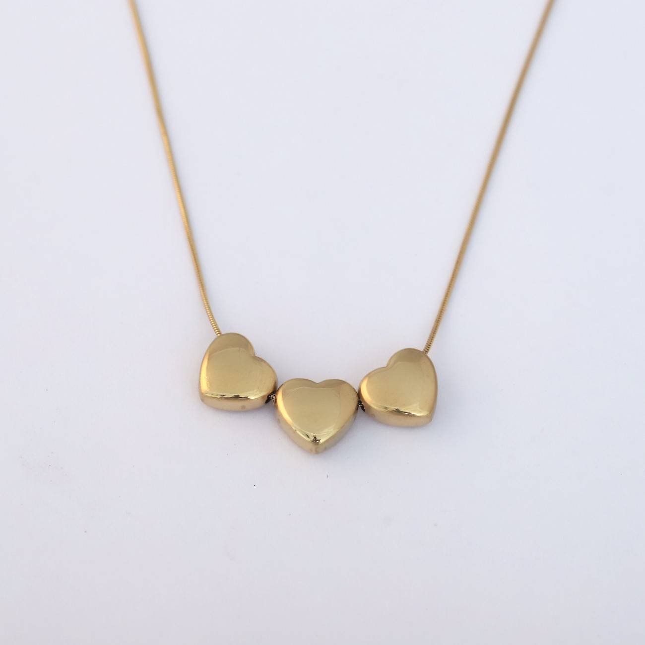 Golden Triple Heart Pendant Necklace